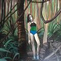 Femme dans la forêt tropicale